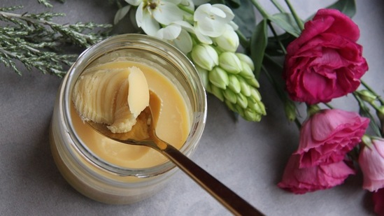 Desi Ghee: Not only does desi ghee goes good with food, but it also benefits the hair. It is packed with enzymes which helps to retain the shine of the hair.(Unsplash)