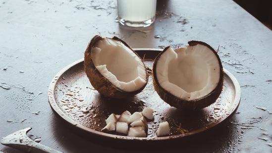 Coconut oil: The fatty oils in coconut oil penetrates inside the hair shaft and lock the protein inside the hair. You can keep this mask overnight and wash it the next morning.(Unsplash)