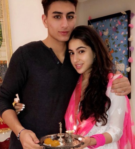 Sara Ali Khan and Ibrahim Ali Khan pose for the camera.