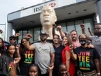 George Floyd's brother Terrence Floyd rises his fist during the George Floyd statue unveiling event in Brooklyn, New York, US.