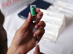 A health worker prepares a dose of the Covishield vaccine, developed by Oxford-AstraZeneca Plc. and manufactured by Serum Institute of India Ltd., for a student, who has a place to study abroad, at a Covid-19 vaccination center set up in a school in New Delhi India, on Thursday, June 24, 2021. (Bloomberg) A health worker prepares a dose of the Covishield vaccine, developed by Oxford-AstraZeneca Plc. and manufactured by Serum Institute of India Ltd., for a student, who has a place to study abroad, at a Covid-19 vaccination center set up in a school in New Delhi India, on Thursday, June 24, 2021. (Bloomberg)