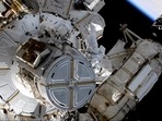 This photo provided by NASA shows astronauts NASA's Shane Kimbrough and France's Thomas Pesquet during a space walk outside the International Space Station on Friday, June 25, 2021. The astronauts finished work to install another new solar panel outside the station. (AP)
