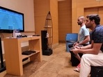 Shikhar Dhawan and Bhuvneshwar Kumar play PlayStation during quarantine in Mumbai(BCCI / Twitter) Shikhar Dhawan and Bhuvneshwar Kumar play PlayStation during quarantine in Mumbai(BCCI / Twitter)