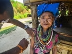 A Reang woman recieves a COVID-19 vacccine dose at Gobindabari village in Chawmanu, near Agartala