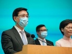 From the right, Hong Kong's Chief Executive Carrie Lam, Secretary for Security Chris Tang, and Chief Secretary John Lee attend a news conference in Hong Kong, on Friday, June 25, 2021. (AP Photo/Kin Cheung) From the right, Hong Kong's Chief Executive Carrie Lam, Secretary for Security Chris Tang, and Chief Secretary John Lee attend a news conference in Hong Kong, on Friday, June 25, 2021. (AP Photo/Kin Cheung)