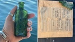Message in a bottle from 1926 discovered by the diver.(Facebook/@Straitsarea) Message in a bottle from 1926 discovered by the diver.(Facebook/@Straitsarea)