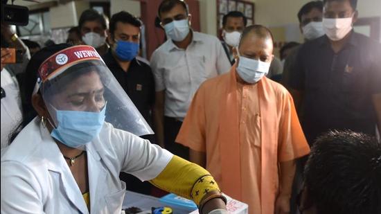 Uttar Pradesh chief minister Yogi Adityanath at a Covid-19 vaccination centre in Lucknow. (PTI FILE PHOTO) Uttar Pradesh chief minister Yogi Adityanath at a Covid-19 vaccination centre in Lucknow. (PTI FILE PHOTO)
