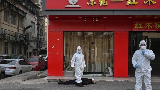 Officially, the first Covid-19 case was identified on December 8 and linked to Wuhan’s Huanan seafood market. (AFP) Officially, the first Covid-19 case was identified on December 8 and linked to Wuhan’s Huanan seafood market. (AFP)