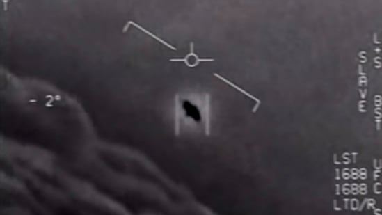US Department of Defense shows part of an unclassified video taken by Navy pilots that have circulated for years showing interactions with "unidentified aerial phenomena". (AFP) US Department of Defense shows part of an unclassified video taken by Navy pilots that have circulated for years showing interactions with "unidentified aerial phenomena". (AFP)
