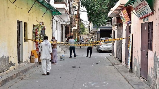 The scene of the crime cordoned off in Ambrahi village in Dwarka Sector 19. (HT Photo) The scene of the crime cordoned off in Ambrahi village in Dwarka Sector 19. (HT Photo)