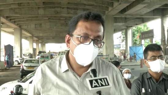 Trinamool Congress MP Dr Santanu Sen's pictures with Debanjan Deb caused a stir. Deb was caught by TMC MP Mimi Chakrabarty for running a fake vaccination drive. (ANI/Twitter)