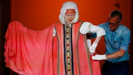 British actress Tilda Swinton performs during rehearsal of "Embodying Pasolini", a performance curated by Olivier Saillard, right, and based on 40 costumes designed by Danilo Donati for Pier Paolo Pasolini's movies, being staged in Rome, Thursday, June 24, 2021. (Cecilia Fabiano/LaPresse via AP)(AP)
