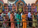 People in a queue to get inoculated with a Covid-19 vaccine at a camp organised outside a temple in Hyderabad on June 25. India's single day Covid-19 case rise dropped to below 50,000 on June 26 as 48,698 fresh cases of the coronavirus disease were logged. pushing the total infection tally to 30,183,143, according to the Union health ministry dashboard at 8am.