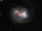 The image, taken with the Nasa/ESA Hubble Space Telescope, features the interacting galaxy pair IC 1623.