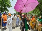 New Delhi: Farmers along with their families and supporters take part in a protest march as they observe June 26 as 'Save Agriculture, Save Democracy' Day to mark seven months of their protest against three farm reform laws, at Singhu border in New Delhi, Saturday, June 26, 2021. 