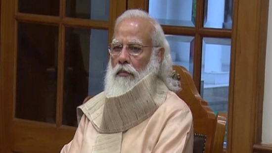 Modi was told by officials at a review meeting on the country’s Covid-19 vaccination programme that 37.7 million doses were administered in the last six days. (ANI Photo) Modi was told by officials at a review meeting on the country’s Covid-19 vaccination programme that 37.7 million doses were administered in the last six days. (ANI Photo)