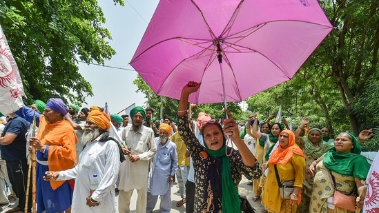 New Delhi: Farmers along with their families and supporters take part in a protest march as they observe June 26 as 'Save Agriculture, Save Democracy' Day to mark seven months of their protest against three farm reform laws, at Singhu border in New Delhi, Saturday, June 26, 2021. (PTI) New Delhi: Farmers along with their families and supporters take part in a protest march as they observe June 26 as 'Save Agriculture, Save Democracy' Day to mark seven months of their protest against three farm reform laws, at Singhu border in New Delhi, Saturday, June 26, 2021. (PTI)