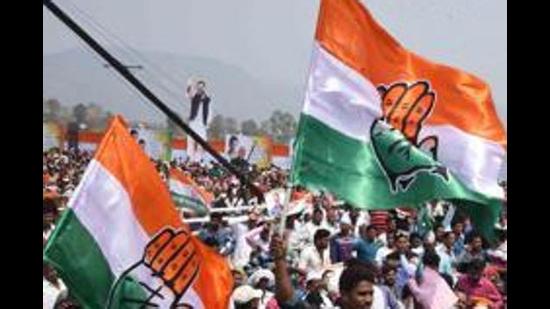 Congress supporters wave party flags. (File photo/Arabinda Mahapatra) Congress supporters wave party flags. (File photo/Arabinda Mahapatra)
