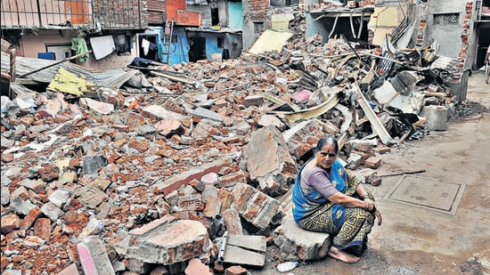 Pune, India - June 25, 2021:Followup of demolition drive of slum area near Dandekar bridge , Ambilodha in Pune, India, on Friday, June 25, 2021.-HT photo (HT PHOTO) Pune, India - June 25, 2021:Followup of demolition drive of slum area near Dandekar bridge , Ambilodha in Pune, India, on Friday, June 25, 2021.-HT photo (HT PHOTO)