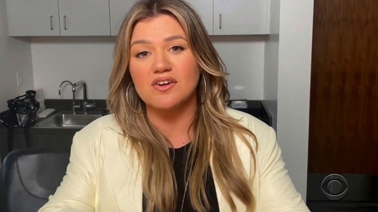 In this video image provided by NATAS and the Daytime Emmys, Kelly Clarkson accepts the award for outstanding entertainment talk show host for The Kelly Clarkson Show during the 48th Daytime Emmy Awards on Friday, June 25, 2021. (NATAS/Daytime Emmys via AP)