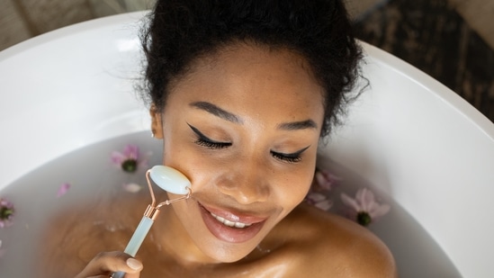 Use an eye-roller: Apply a cooling gel under your eyes and use a metal roller to gently massage the area.(Pexels)