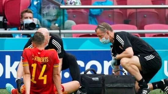 It went from bad to worse for Wales as they lost Connor Roberts to a groin injury in the 38th minute. Neco Williams replaced him(AP)