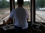 Paulo Marques' son rides a tram from his fathers collection in Carregado, Portugal, June 22, 2021. (REUTERS)