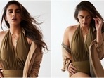 Huma Qureshi in halter-neck monokini and trench coat mixes summer and fall vibes(Instagram/@iamhumaq) Huma Qureshi in halter-neck monokini and trench coat mixes summer and fall vibes(Instagram/@iamhumaq)
