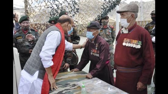 Defence minister Rajnath Singh interacting with the veterans in Leh on Sunday. (PTI) Defence minister Rajnath Singh interacting with the veterans in Leh on Sunday. (PTI)