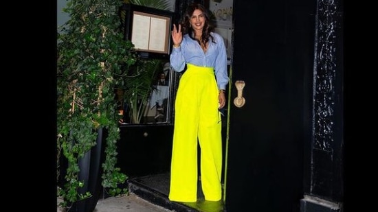 For the occasion, the actor opted for a low neck striped blue shirt which she teamed with high-waisted yellow trousers by American designer Brandon Maxwell’s fashion label. (Instagram/@priyankachopra)
