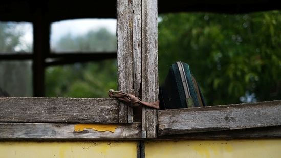 A window of one of Paulo Marques' collection trams to be restored is seen in Carregado, Portugal, June 22, 2021.  (REUTERS)