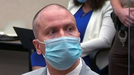 Former Minneapolis police officer Derek Chauvin reacts as he listens to the judge announce his sentence of 22.5 years in prison for the murder of George Floyd during his sentencing hearing in Minneapolis. (via Reuters)