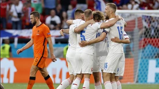 Netherlands' Stefan de Vrij looks dejected after the match as Czech Republic's players celebrate. (Pool via REUTERS) Netherlands' Stefan de Vrij looks dejected after the match as Czech Republic's players celebrate. (Pool via REUTERS)