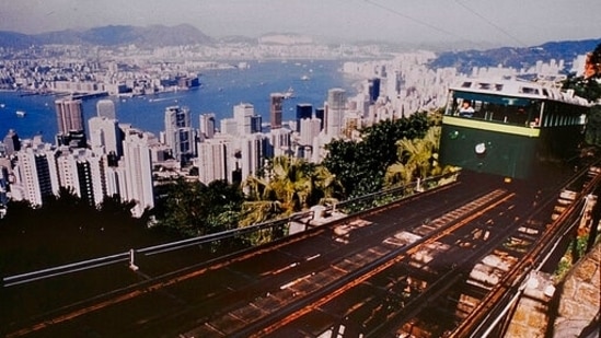 In this undated photo provided by Hong Kong Peak Tramways, a 4th generation Peak Tram which serviced from 1959 to 1989 is seen in Hong Kong. The Peak Tram started operations in 1888, when Hong Kong was a British colony, to transport people up Victoria Peak instead of using sedan chairs. The original carriages were made of varnished timber and seated 30 passengers in three classes. (AP)