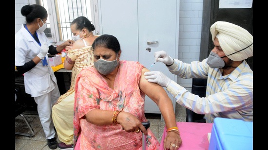 Women getting their second dose of Covid-19 vaccines at CHC Model Town, in Patiala. (HT FILE)