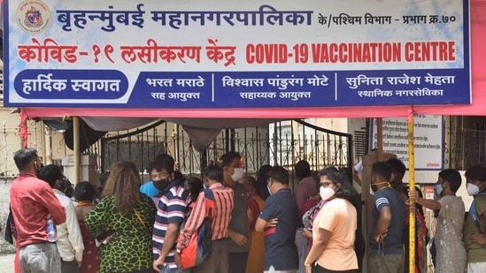 People wait in a queue to get inoculated against Covid-19 at Babasaheb Gawde Hospital, Vile Parle, in Mumbai (Satish Bate/HT photo) People wait in a queue to get inoculated against Covid-19 at Babasaheb Gawde Hospital, Vile Parle, in Mumbai (Satish Bate/HT photo)