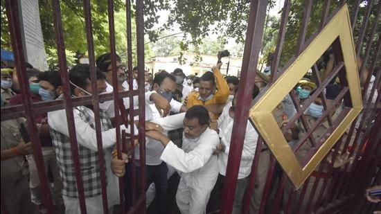 Supporters of candidates jostle for space at the entrance to the Gorakhpur collectorate office. (PTI PHOTO) Supporters of candidates jostle for space at the entrance to the Gorakhpur collectorate office. (PTI PHOTO)
