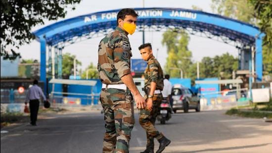 Jammu: Security personnel patrol after two low intensity explosions reported in the technical area of Jammu Air Force Station in the early hours of Sunday. (PTI)