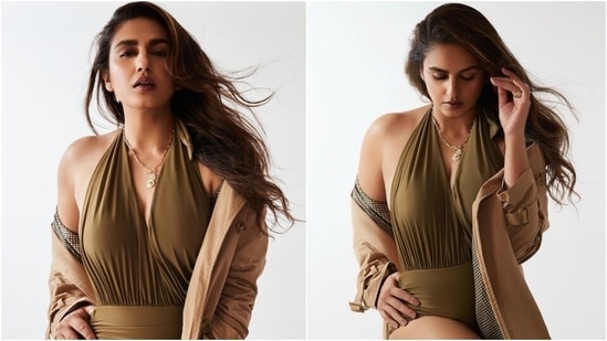 Huma Qureshi in halter-neck monokini and trench coat mixes summer and fall vibes(Instagram/@iamhumaq)