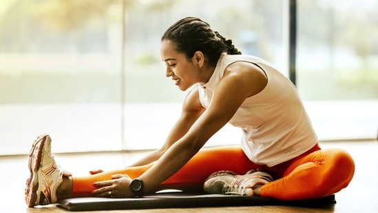 Stretching: If you do not feel like working out then try getting up and do some simple stretches. This will relax the muscles and also keep the mind calm.(Unsplash)