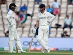 New Zealand's captain Kane Williamson , right, waits with batting partner Devon Conway for the umpire's decision.(AP) New Zealand's captain Kane Williamson , right, waits with batting partner Devon Conway for the umpire's decision.(AP)
