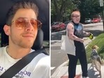 Nick Jonas pulled up next to a fan wearing a Jonas Brothers T-shirt and took a selfie with her.