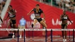 Sydney McLaughlin sets a new world record in the finals of the women's 400-meter hurdles at the U.S. Olympic Track and Field Trials.(AP)