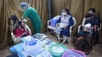 A healthcare worker administers a dose of Covid-19 vaccine to a sex worker, at Wadia hospital in Mumbai on Monday.(PTI Photo) A healthcare worker administers a dose of Covid-19 vaccine to a sex worker, at Wadia hospital in Mumbai on Monday.(PTI Photo)
