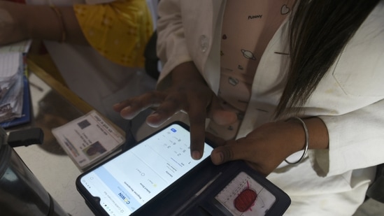A health worker registering a person on the CoWIN app for Covid-19 vaccination, at sector 22 (UPHC) urban primary health center, in Noida (Sunil Ghosh / Hindustan Times). A health worker registering a person on the CoWIN app for Covid-19 vaccination, at sector 22 (UPHC) urban primary health center, in Noida (Sunil Ghosh / Hindustan Times).