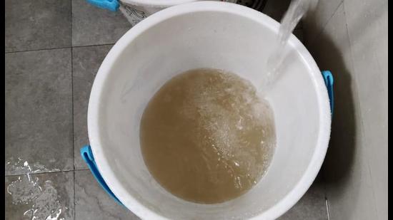 Muddy water supplied to a house in Sector 38 West on Monday. (HT Photo) Muddy water supplied to a house in Sector 38 West on Monday. (HT Photo)