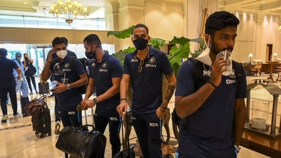 In the foreground of this image, Sanju Samson can been seen sipping his drink while Rahul Chahar looks on. (TWITTER/BCCI) In the foreground of this image, Sanju Samson can been seen sipping his drink while Rahul Chahar looks on. (TWITTER/BCCI)