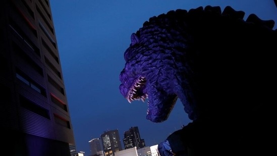The head of Godzilla is displayed on the 8th floor of Gracery hotel in Kabukicho, a nightlife area in Shinjuku, Tokyo on June 3. "I can't seem to enjoy myself as much as I did last time," an elderly woman who saw the first Games said to her husband as they rested during a stroll - in the evening, to avoid the virus, Reuters reported. "It's disheartening, like somebody else's problem. I don't feel like it's being held in my country," she added.(Androniki Christodoulou / REUTERS)