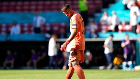 Spain's goalkeeper Unai Simon reacts after taking an own goal during the Euro 2020 football match against Croatia.(AP)