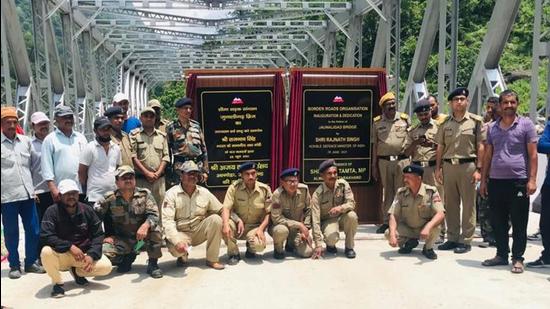 BRO staff after the inauguration of one of the new bailey bridges in Jauljibi area in Pithoragarh on Monday, June 28. (HT photo)